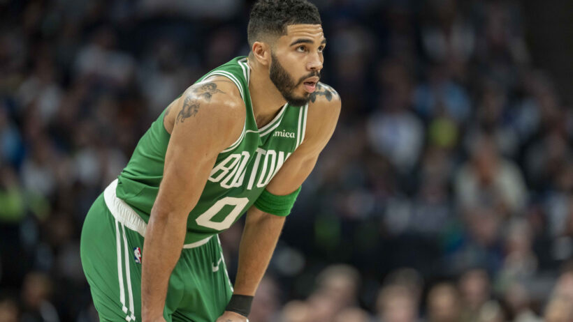 Jayson Tatum hands on shorts