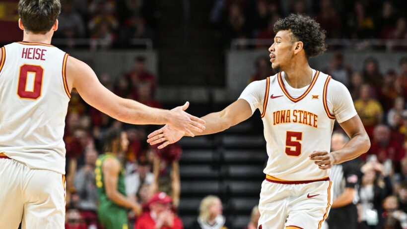 Curtis Jones celebrates with a teammate after a bucket.