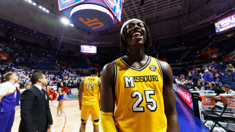 Missouri Tigers guard Mark Mitchell smiling after a win