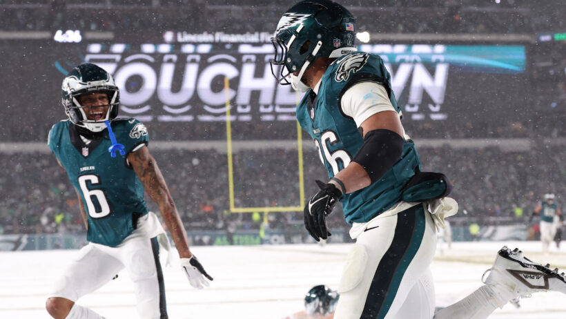 Philadelphia Eagles running back Saquon Barkley celebrates a TD with wide receiver DeVonta Smith