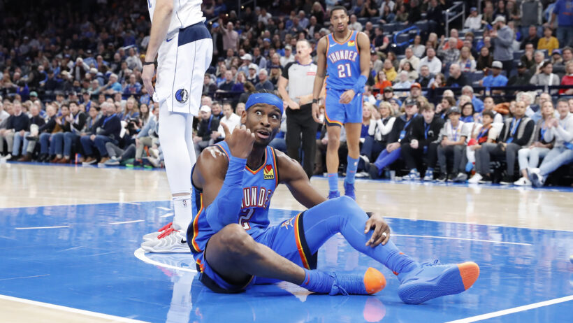 Shai Gilgeous-Alexander sitting on court
