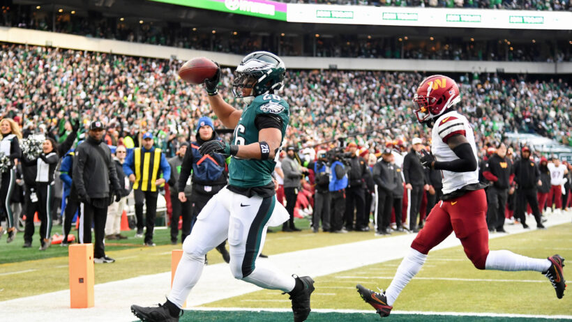 Philadelphia Eagles running back Saquon Barkley scores a TD against the Washington Commanders
