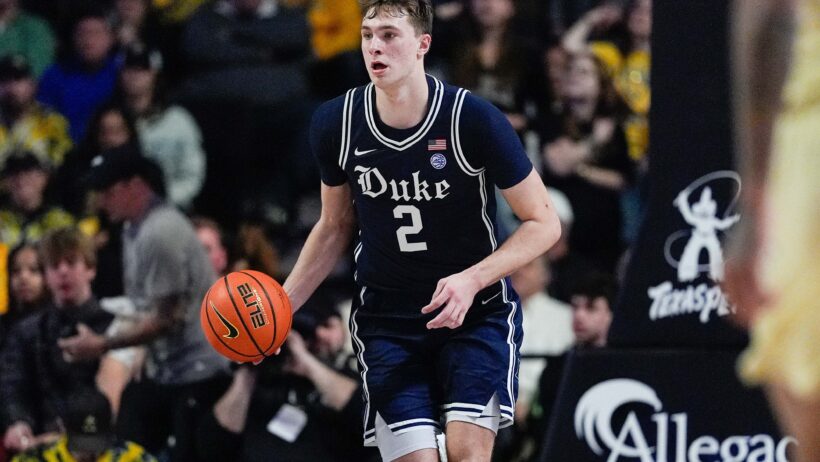 Duke Blue Devils guard Cooper Flagg dribbling the ball up the court