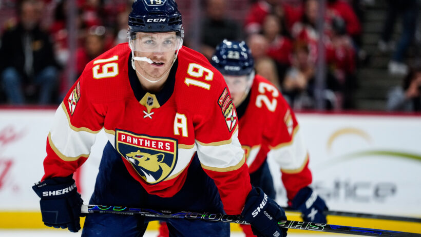 Panthers left wing Matthew Tkachuk and center Carter Verhaeghe watch a face-off
