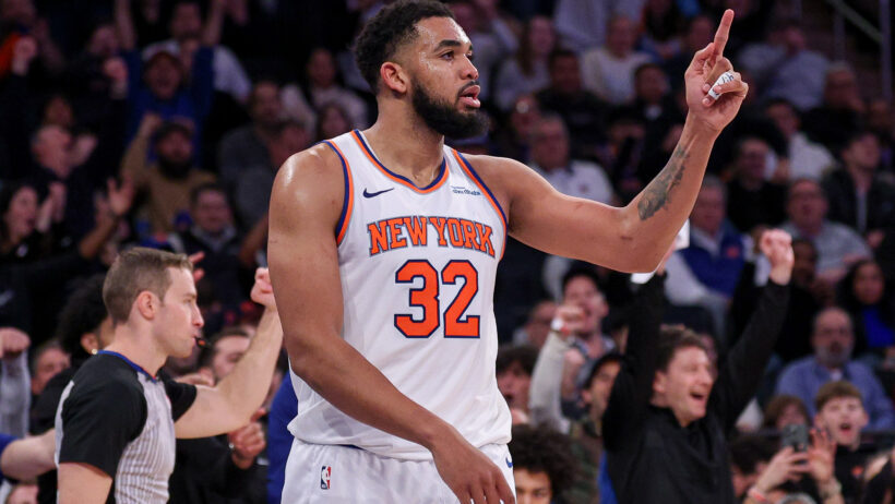 Karl-Anthony Towns pointing up