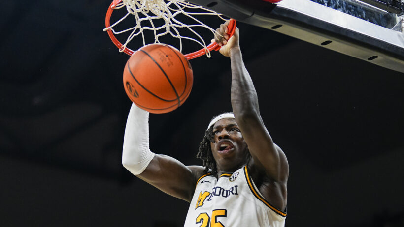 Missouri Tigers guard Mark Mitchell dunking