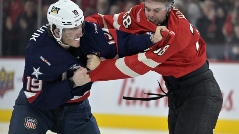 Team United States forward Matthew Tkachuk and Team Canada forward brandon Hagel fight