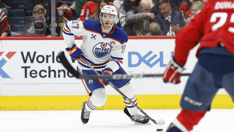 McDavid skating with puck