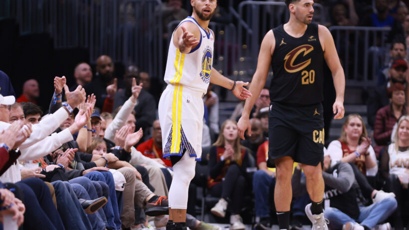 Golden State Warriors guard Steph Curry questions a call