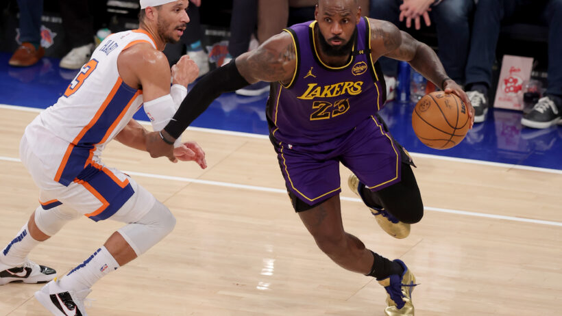 Los Angeles Lakers forward LeBron James tries to drive around New York Knicks guard Josh Hart