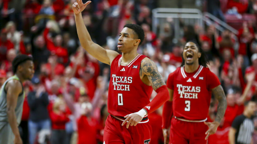 Texas Tech Red Raiders guard Chance McMillian reacts with guard Elijah Hawkins