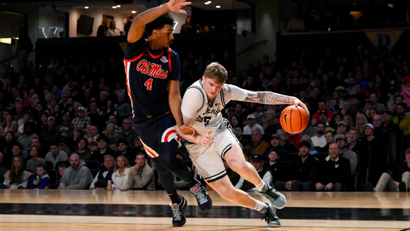 Vanderbilt Commodores guard Tyler Nickel drives against Mississippi Rebels forward Jaemyn Brakefield
