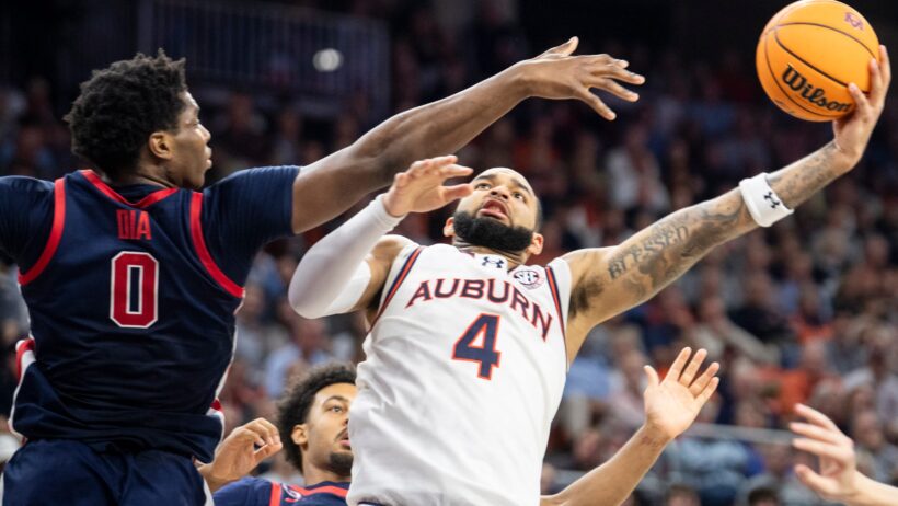 Auburn Tigers forward Johni Broome shoots against Ole Miss