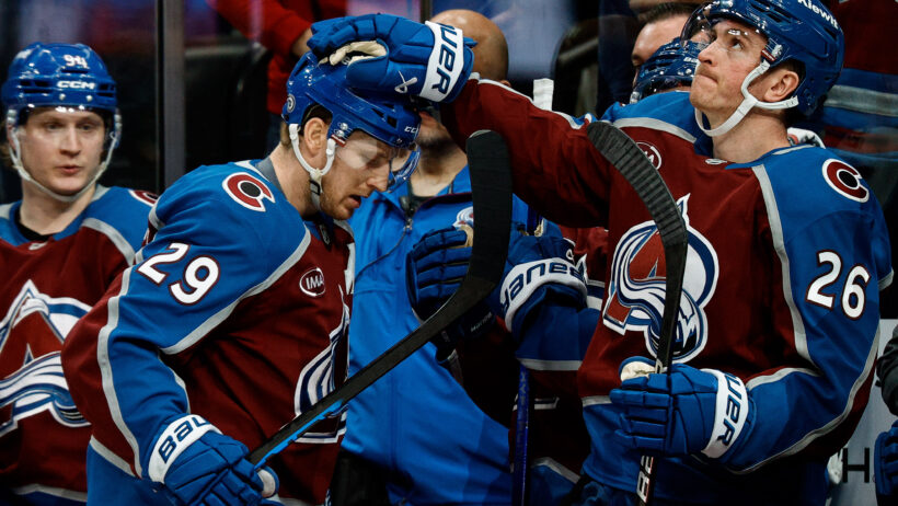 Jimmy Vesey taps Nathan MacKinnon on the head