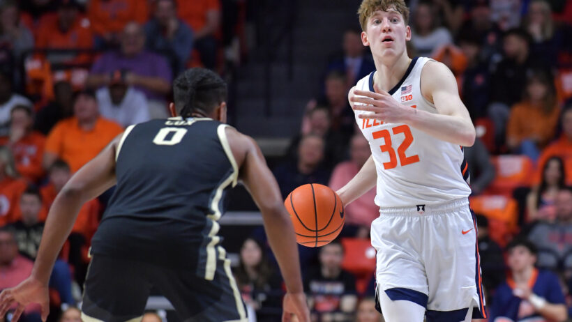 Illinois Fighting Illini guard Kasparas Jakucionis dribbling up the court