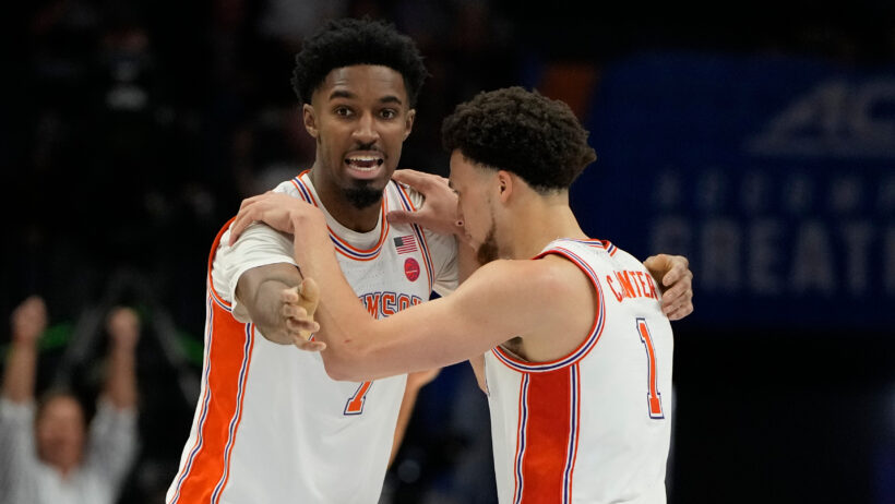 Chauncey Wiggins and Chase Hunter hug