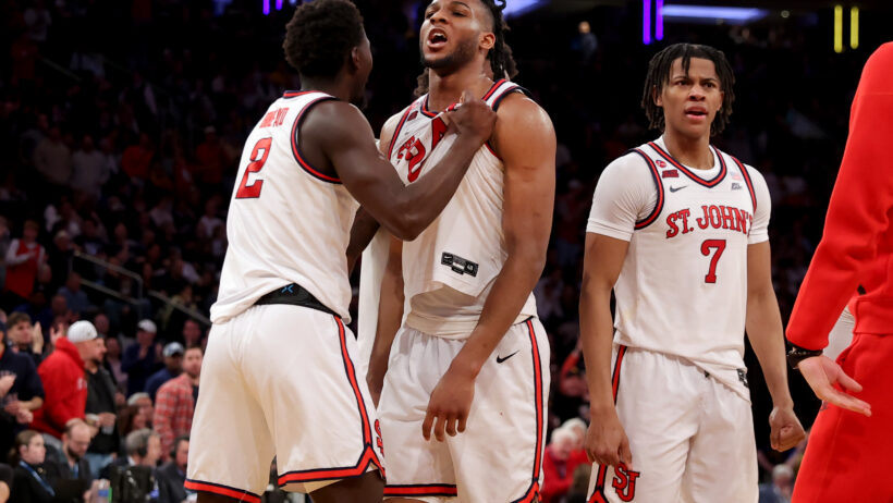 Zuby Ejiofor celebrating with teammates