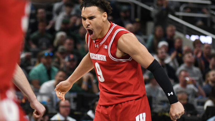 Wisconsin Badgers guard John Tonje celebrates a bucket against Michigan State