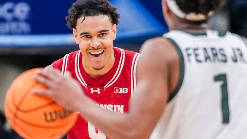 Wisconsin Badgers guard John Tonje smiling
