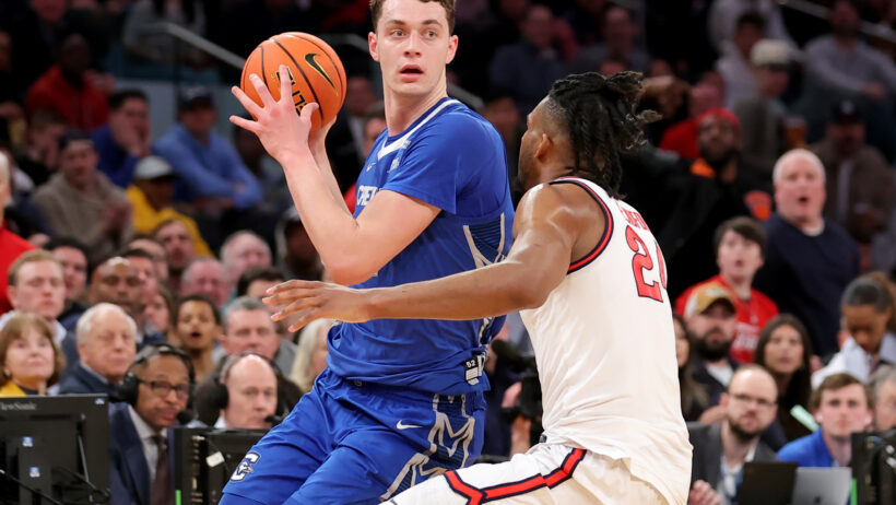 Creighton Bluejays center Ryan Kalkbrenner holds the ball in the post