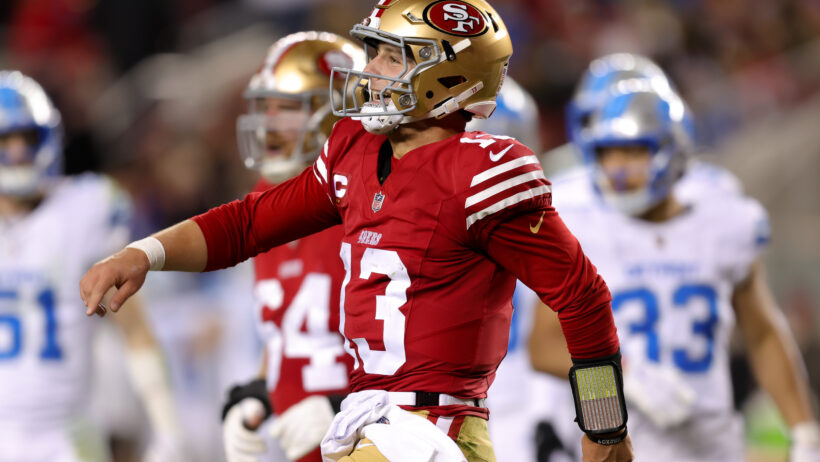 Brock Purdy celebrates a touchdown versus the Lions.