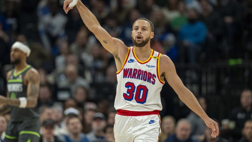 Golden State Warriors guard Stephen Curry gestures after hitting a three