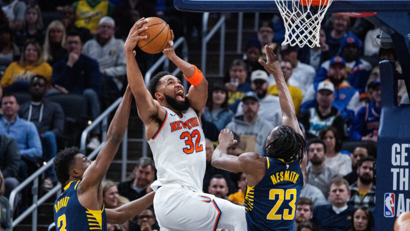 New York Knicks center Karl-Anthony Towns dunking on the Indiana Pacers