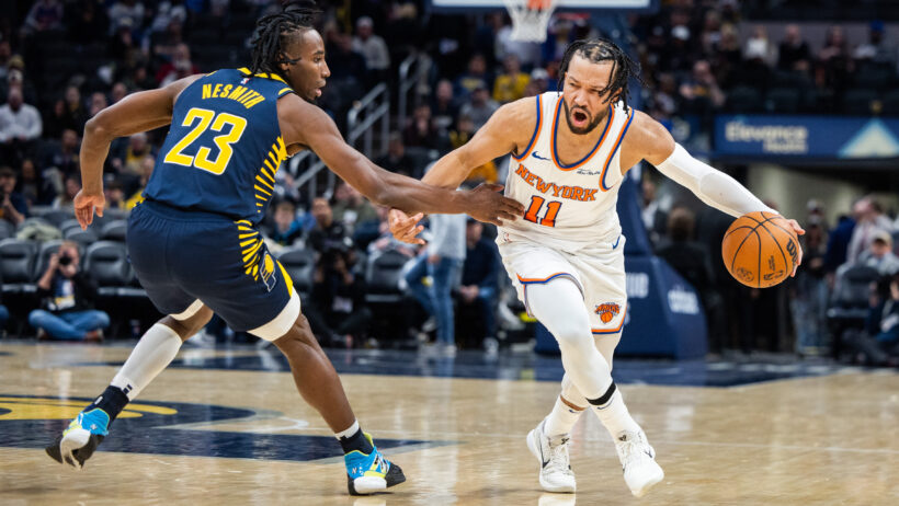 New York Knicks guard Jalen Brunson dribbling as Indiana Pacers forward Aaron Nesmith defends