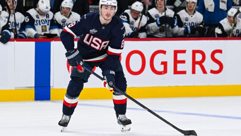 Team USA defenseman Zach Werenski plays the puck