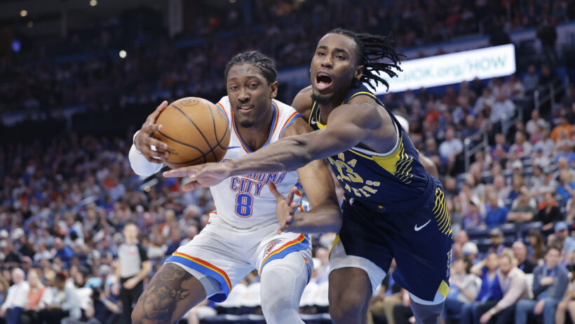 Indiana Pacers forward Aaron Nesmith and Oklahoma City Thunder forward Jalen Williams battle for a loose ball
