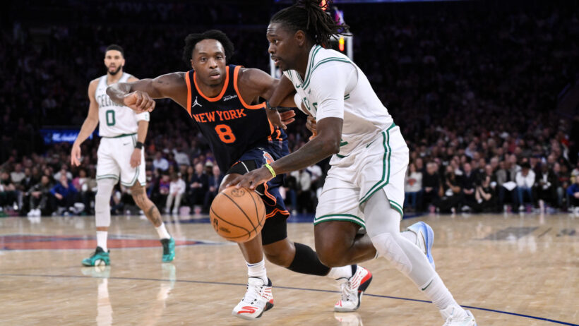 Boston Celtics guard Jrue Holiday driving around New York Knicks forward OG Anunoby