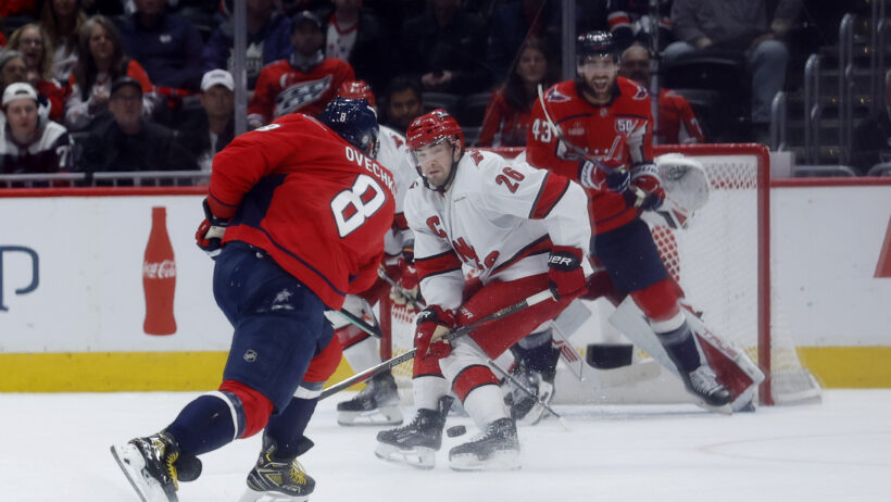 Washington Capitals left wing Alex Ovechkin shoots the puck as Carolina Hurricanes