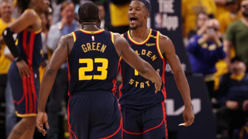Jimmy Butler celebrates a bucket with Draymond Green.