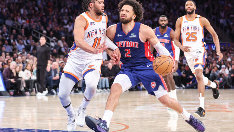 Detroit Pistons guard Cade Cunningham tries to drive past New York Knicks guard Jalen Brunson