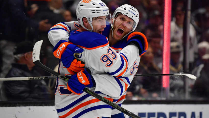 Connor McDavid and Ryan Nugent-Hopkins celebrating