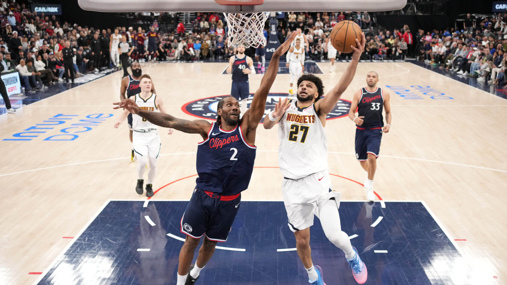 Jamal Murray layup contested by Kawhi Leonard
