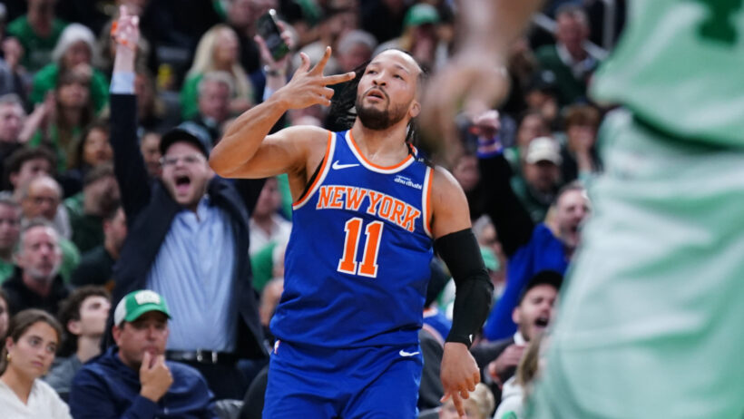 New York Knicks guard Jalen Brunson gestures to the crowd after hitting a three