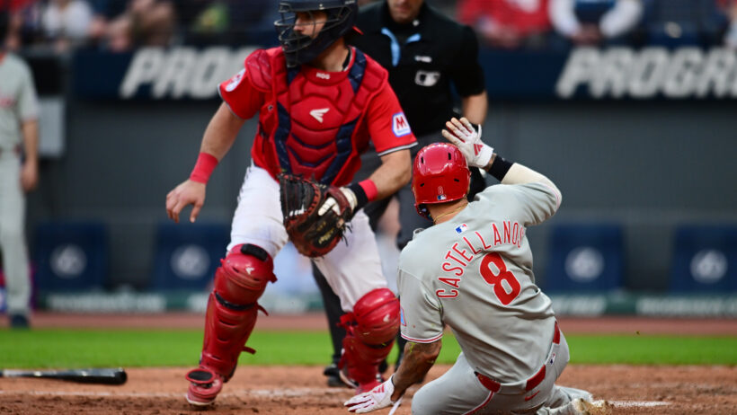 Philadelphia Phillies right fielder Nick Castellanos slides into home against the Cleveland Guardians
