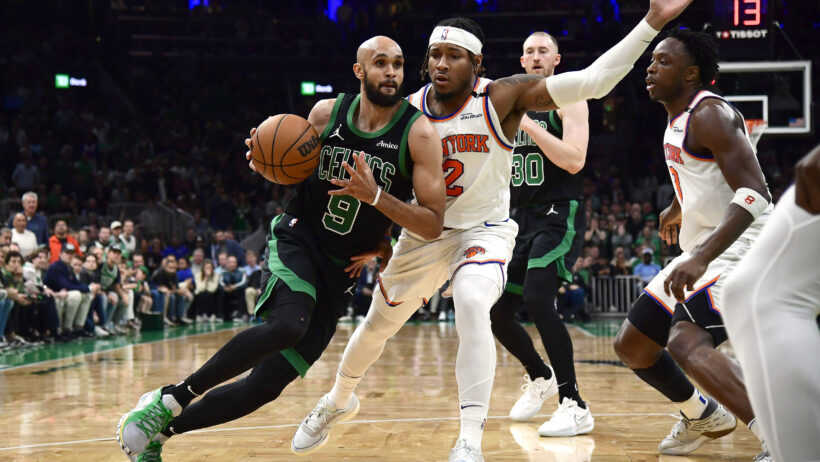 Boston Celtics guard Derrick White drives past New York Knicks guard Miles McBride