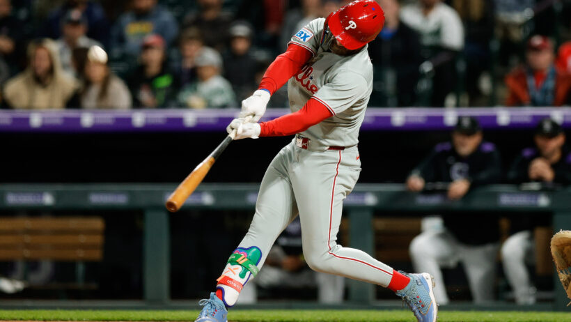 Bryce Harper hitting the ball vs Colorado