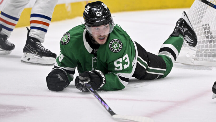 Wyatt Johnson laying on ice