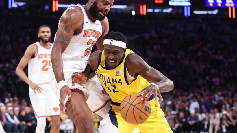 Pascal Siakam drives into Mitchell Robinson.