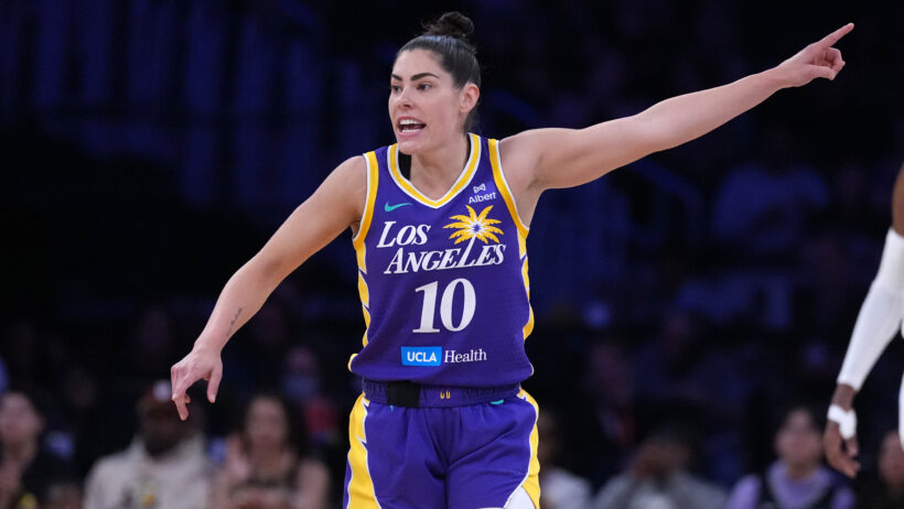 Kelsey Plum gestures to an LA Sparks teammate.