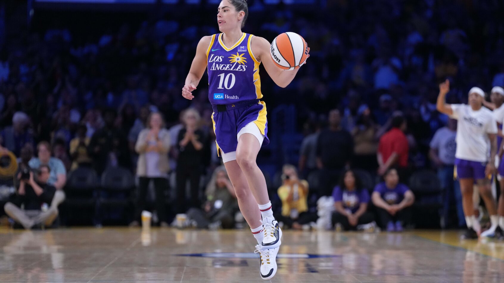 LA Sparks guard Kelsey Plum brings the ball up the floor