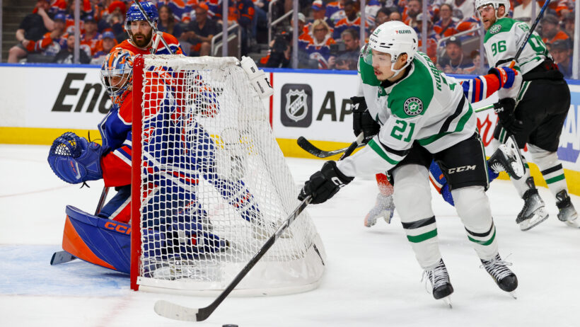 Jason Robertson controls the puck in the Oilers zone.