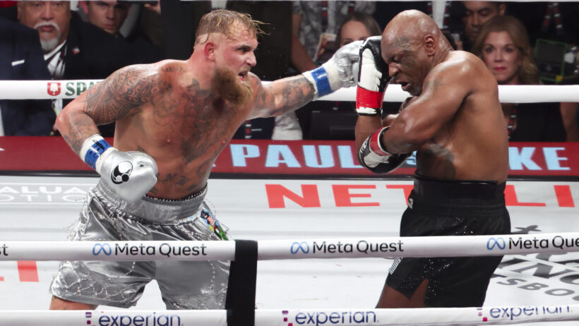 Nov 15, 2024; Arlington, Texas, UNITED STATES; Mike Tyson (black gloves) fights Jake Paul (silver gloves) at AT&T Stadium. Mandatory Credit: Kevin Jairaj-Imagn Images