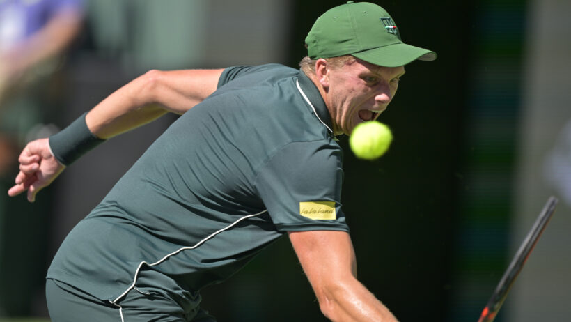 Jenson Brooksby hitting a volley