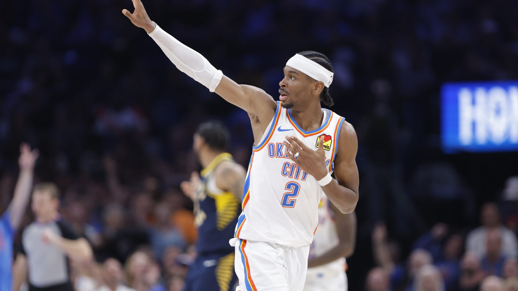 Oklahoma City Thunder guard Shai Gilgeous-Alexander gestures to the crowd