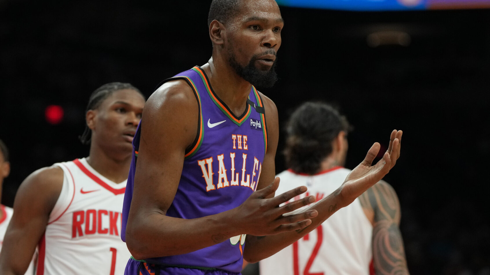 Phoenix Suns forward Kevin Durant shrugging at the ref