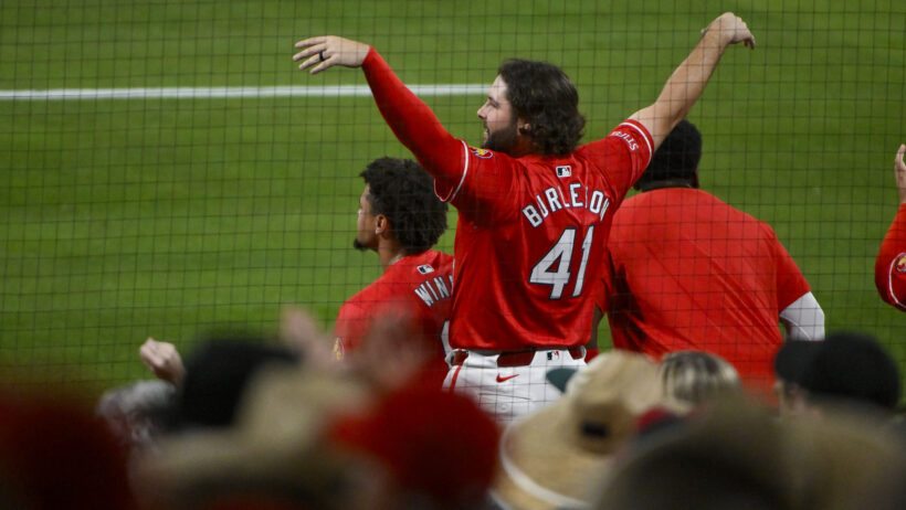 Alec Burleson celebrating after a hit